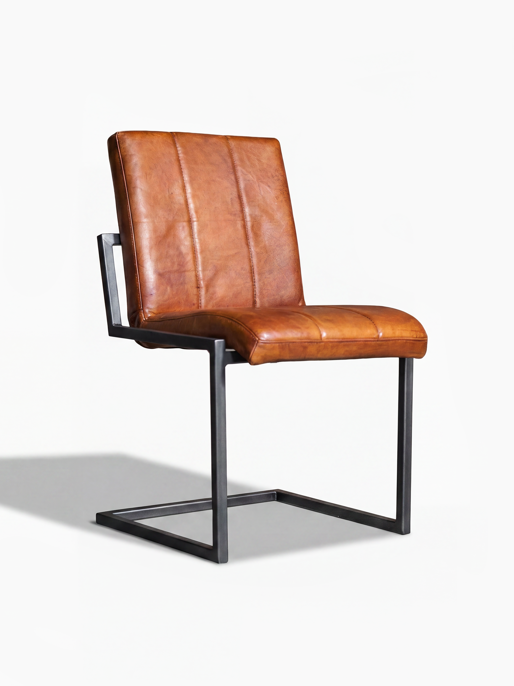 Freischwinger Stuhl COOPER ohne Armlehne aus Leder in Cognac