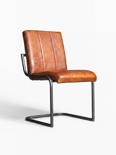 Eleganter Freischwinger Stuhl COOPER ohne Armlehne aus Leder in Cognac