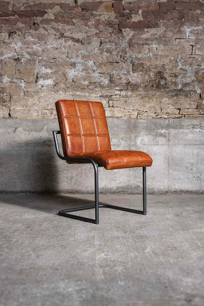 Freischwinger Stuhl FARGO ohne Armlehne aus Leder in Cognac